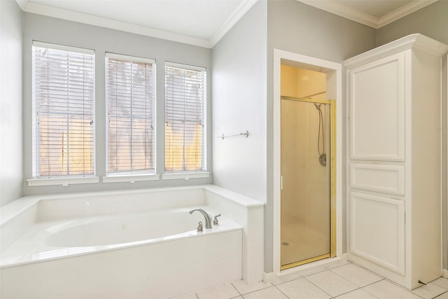 bathroom with tile patterned flooring, a wealth of natural light, and plus walk in shower