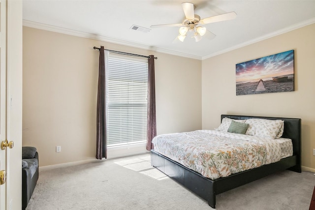 bedroom with ceiling fan, light colored carpet, and ornamental molding