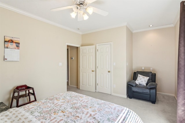 bedroom featuring light colored carpet, ceiling fan, and crown molding