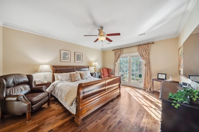 bedroom with access to exterior, ceiling fan, dark hardwood / wood-style flooring, and ornamental molding