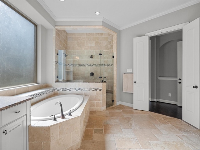 bathroom with separate shower and tub and crown molding