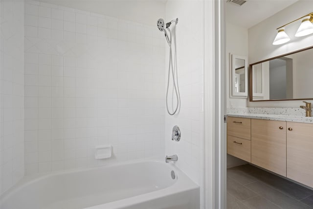 bathroom featuring vanity and shower / bathtub combination