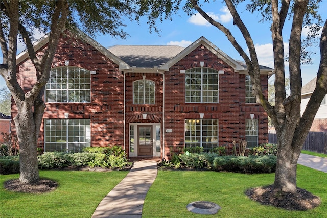 view of front of home with a front lawn