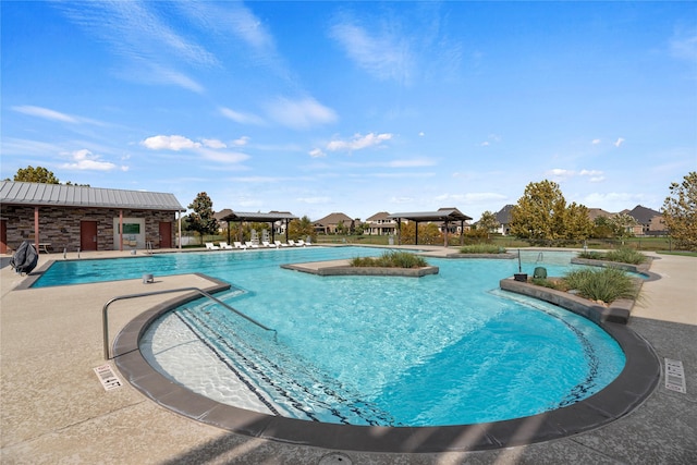 view of pool with a gazebo and a patio