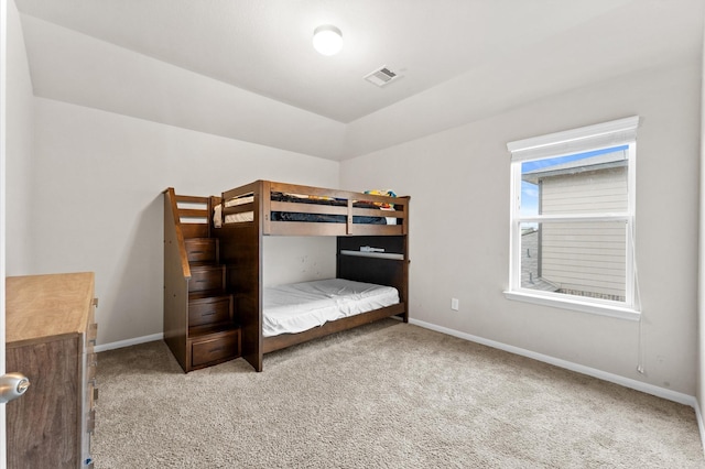 unfurnished bedroom with light carpet