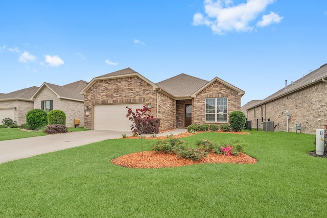 view of front of house with a front yard, a garage, and cooling unit