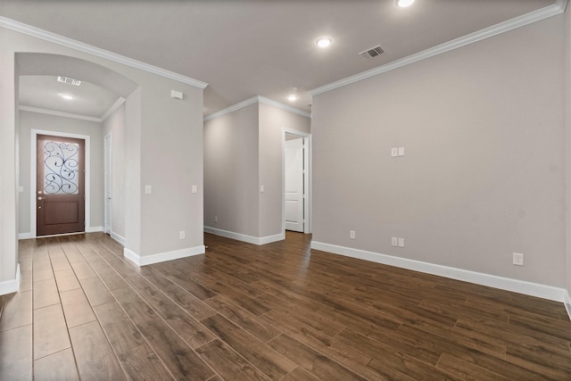 interior space featuring dark hardwood / wood-style flooring and ornamental molding