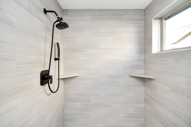 details featuring a tile shower