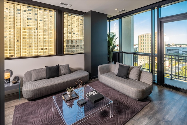 living room featuring hardwood / wood-style floors and floor to ceiling windows