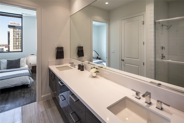 bathroom with vanity and walk in shower