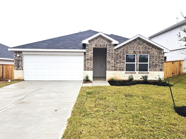 ranch-style house with a garage and a front lawn