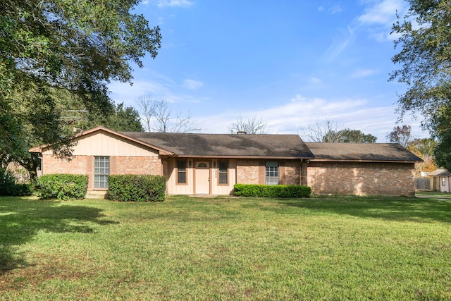 view of front of home with a front lawn