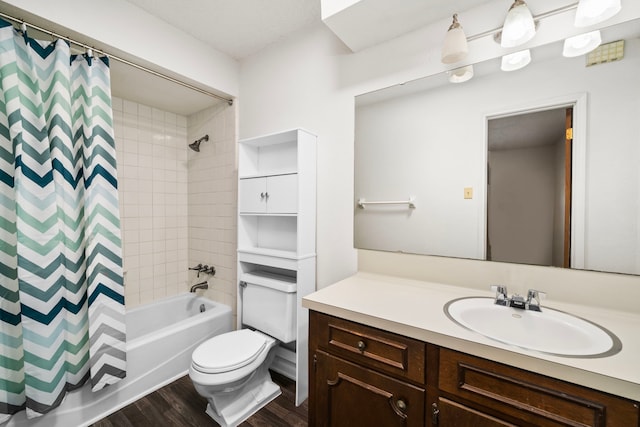 full bathroom with toilet, shower / bath combo, wood-type flooring, and vanity