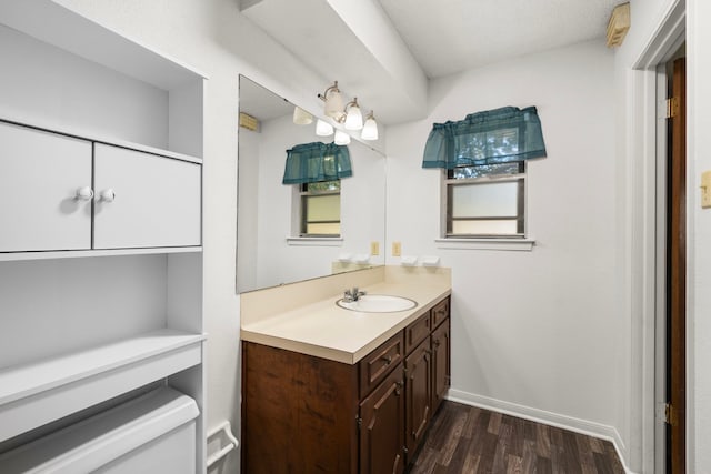 bathroom featuring vanity and hardwood / wood-style floors