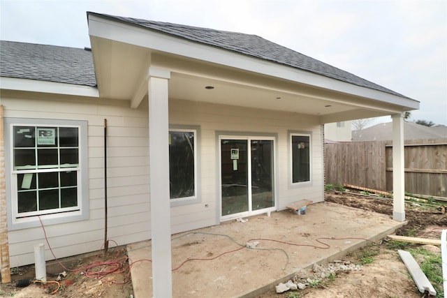 rear view of property featuring a patio area