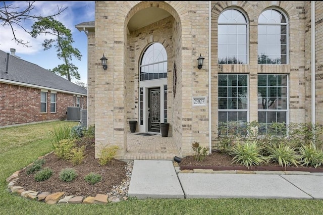 doorway to property with central air condition unit