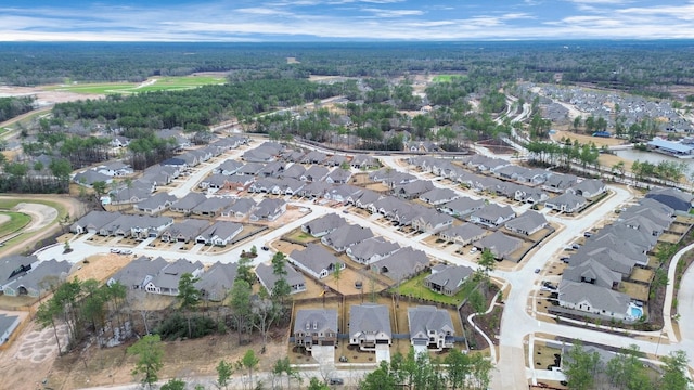 birds eye view of property with a residential view