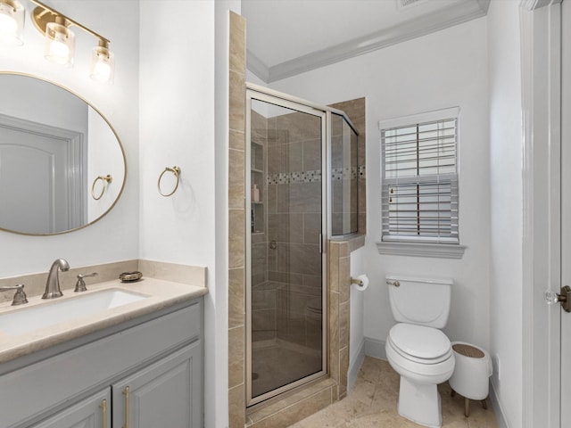 bathroom featuring vanity, a shower with door, crown molding, tile patterned flooring, and toilet