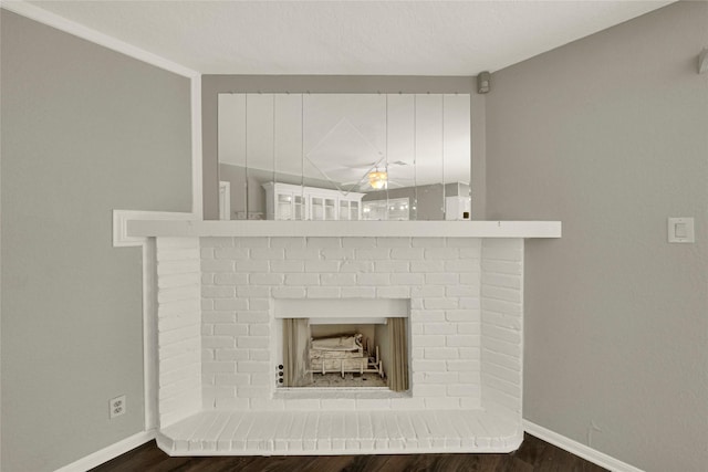 interior details with a fireplace and hardwood / wood-style floors