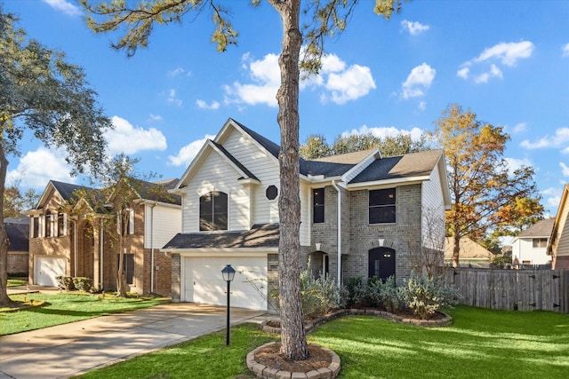 view of property with a garage and a front lawn