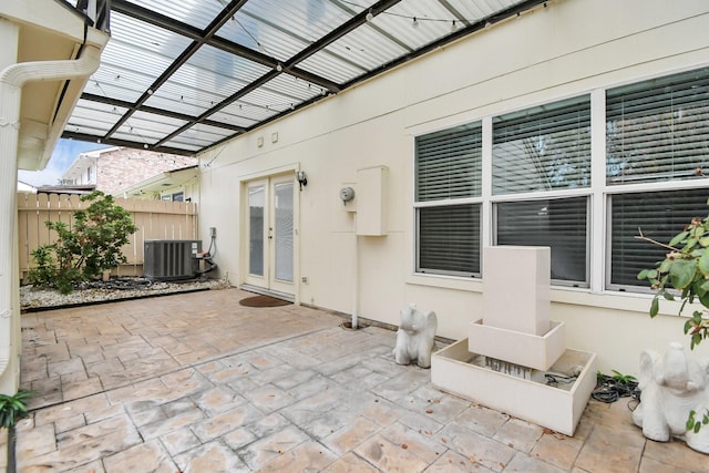 view of patio / terrace with central AC and french doors