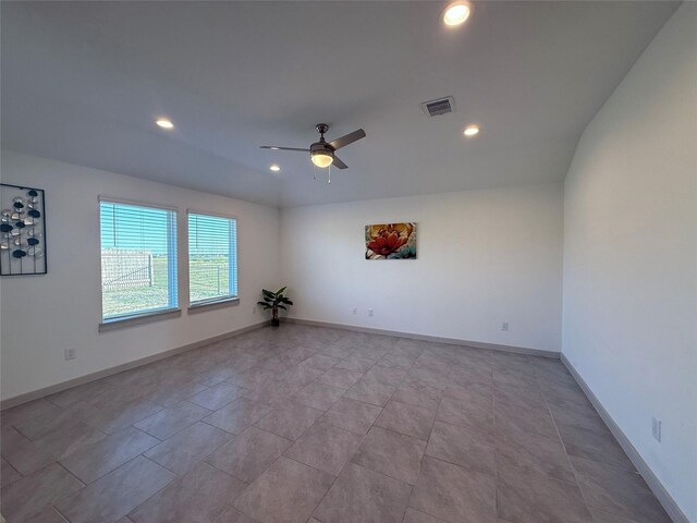 unfurnished room with baseboards, visible vents, light tile patterned flooring, recessed lighting, and ceiling fan