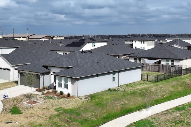 drone / aerial view with a residential view