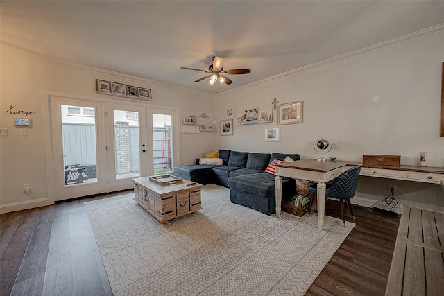 living room featuring ceiling fan, light hardwood / wood-style flooring, and ornamental molding