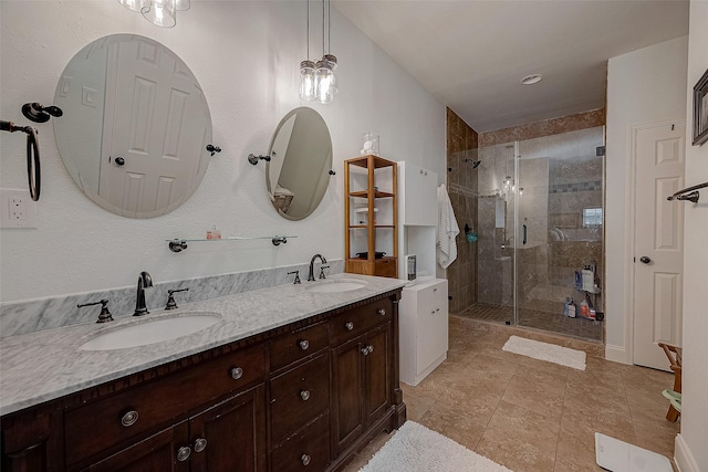 bathroom with vanity and an enclosed shower