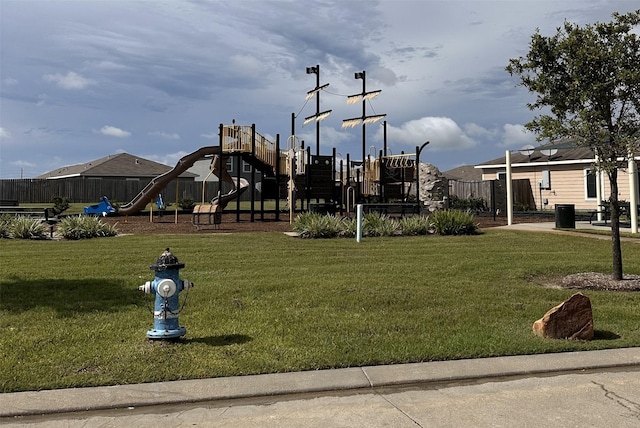 view of playground with a yard