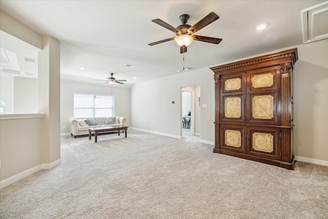 unfurnished room featuring light carpet and ceiling fan