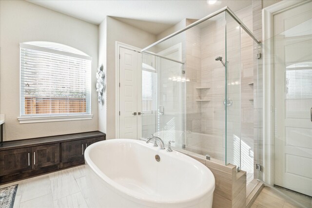 bathroom with independent shower and bath