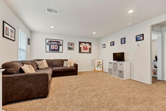 living room featuring light carpet