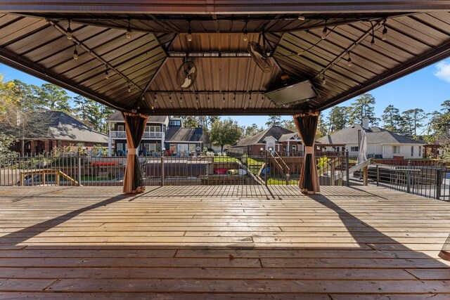 wooden deck featuring a gazebo