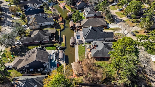 birds eye view of property with a residential view