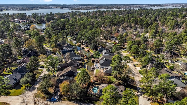 bird's eye view featuring a residential view and a water view