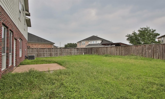 view of yard featuring central AC