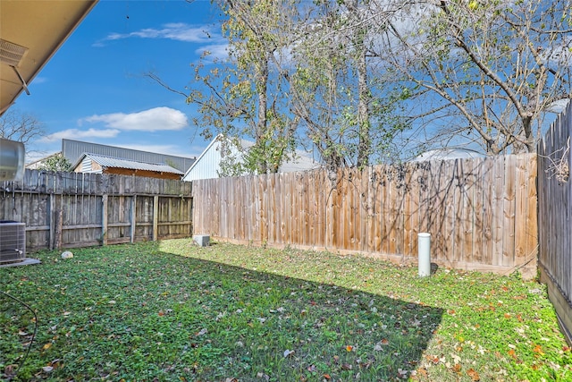 view of yard with central AC unit