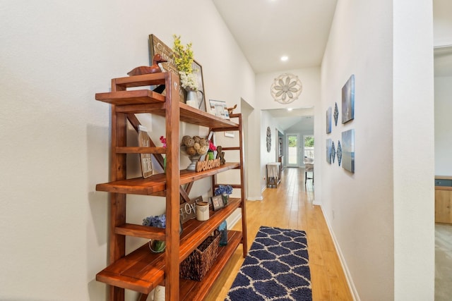 hallway featuring light wood-type flooring