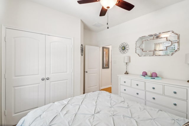 bedroom with a closet and ceiling fan