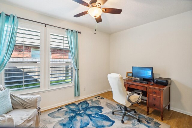 office space featuring ceiling fan and hardwood / wood-style floors