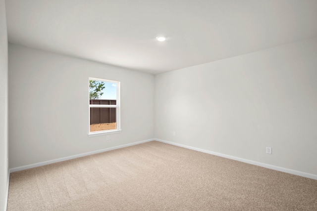 spare room featuring carpet flooring