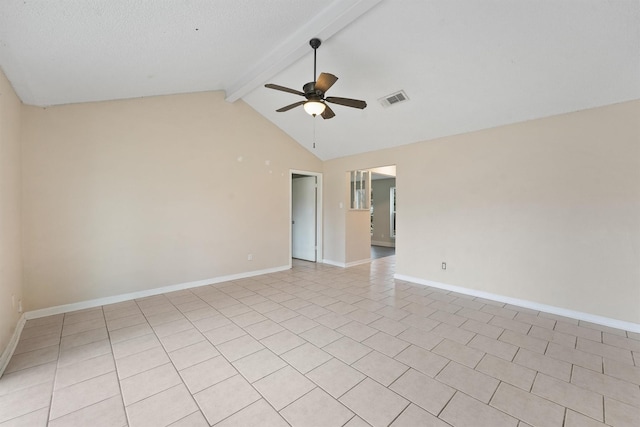 tiled spare room with ceiling fan, lofted ceiling with beams, and a textured ceiling