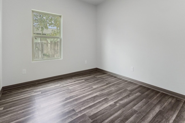 spare room featuring hardwood / wood-style flooring