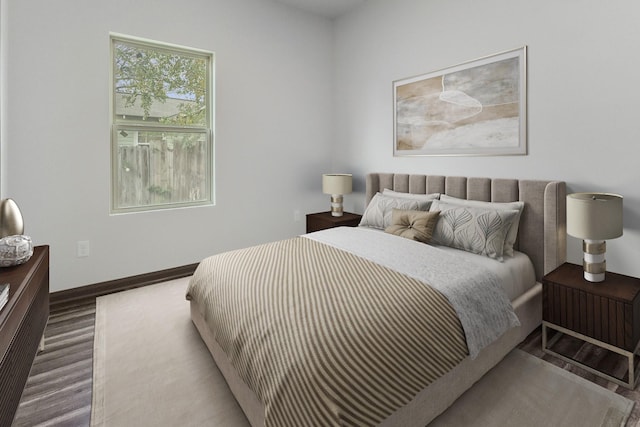 1101 Johnson St, Baytown, TX 77520 - bedroom featuring baseboards and wood finished floors