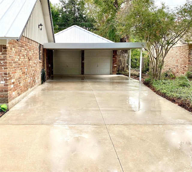 garage with concrete driveway