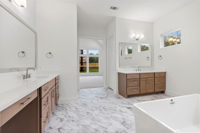 bathroom featuring a bathtub and vanity