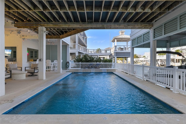 view of swimming pool with a patio