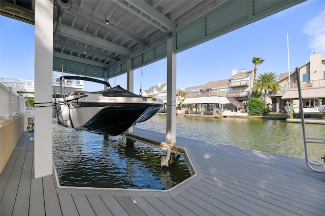 dock area with a water view