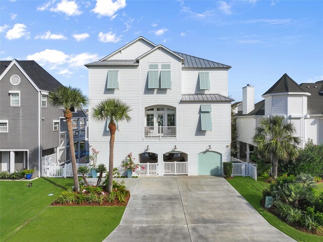 view of front facade with a garage and a front yard